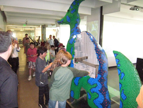 Working on a life-size Lego dinosaur